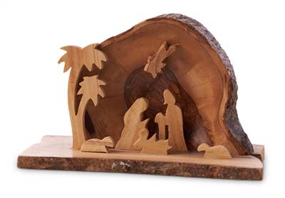 Arched grotto with holy family under star